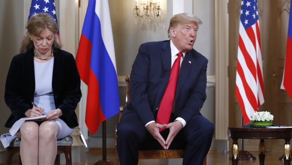 Interpreter interpreter Marina Gross, left, takes notes when U.S. President Donald Trump talks to Russian President Vladimir Putin at the beginning of their one-on-one-meeting at the Presidential Palace in Helsinki, Finland, Monday, July 16, 2018. Interpreter interpreter Marina Gross, left, takes notes when U.S. President Donald Trump talks to Russian President Vladimir Putin at the beginning of their one-on-one-meeting at the Presidential Palace in Helsinki, Finland, Monday, July 16, 2018. - Sputnik International
