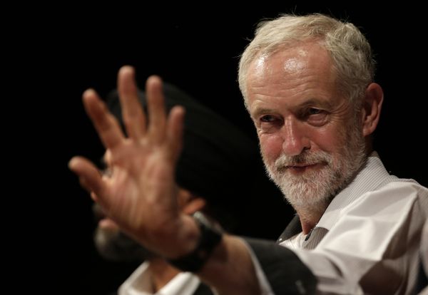 British lawmaker Jeremy Corbyn waves to a member of the audience prior to addressing a meeting during his election campaign for the leadership of the British Labour Party in Ealing, west London, Monday, Aug. 17, 2015 - Sputnik International