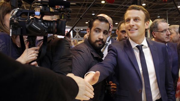 Emmanuel Macron, center, flanked by his bodyguard, Alexandre Benalla, left, visits the Agriculture Fair in Paris, Wednesday, March 1, 2017 Emmanuel Macron, center, flanked by his bodyguard, Alexandre Benalla, left, visits the Agriculture Fair in Paris, Wednesday, March 1, 2017 - Sputnik International