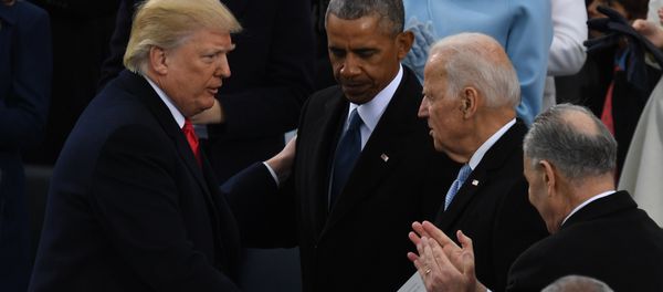 US President Donald Trump (L) shakes hands with former US President Barack Obama (C) and former vice-President Joe Biden after being sworn in as President on January 20, 2017 at the US Capitol in Washington, DC. - Sputnik International