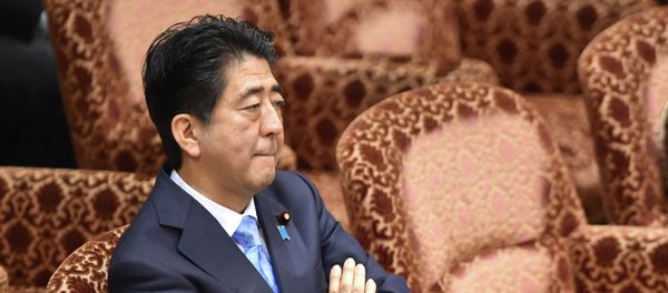 Japan's Prime Minister Shinzo Abe attends an upper house special committee session at the parliament in Tokyo on July 28, 2015. - Sputnik International