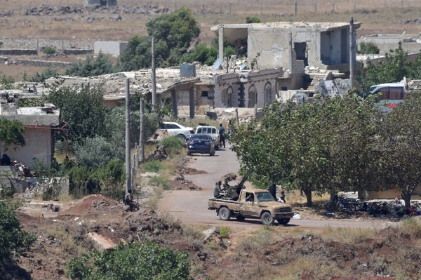 An armed man rides a pickup truck at the Syrian side of the Israeli-Syrian border as it is seen from the Israeli-occupied Golan Heights, Israel July 20, 2018 An armed man rides a pickup truck at the Syrian side of the Israeli-Syrian border as it is seen from the Israeli-occupied Golan Heights, Israel July 20, 2018 - Sputnik International