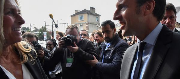 A picture taken on October 11, 2016 shows then French presidential election candidate for the En Marche! movement Emmanuel Macron (R) and Head of Security Alexandre Benalla (2ndR) arriving for a campaign meeting in Le Mans, western France A picture taken on October 11, 2016 shows then French presidential election candidate for the En Marche! movement Emmanuel Macron (R) and Head of Security Alexandre Benalla (2ndR) arriving for a campaign meeting in Le Mans, western France - Sputnik International