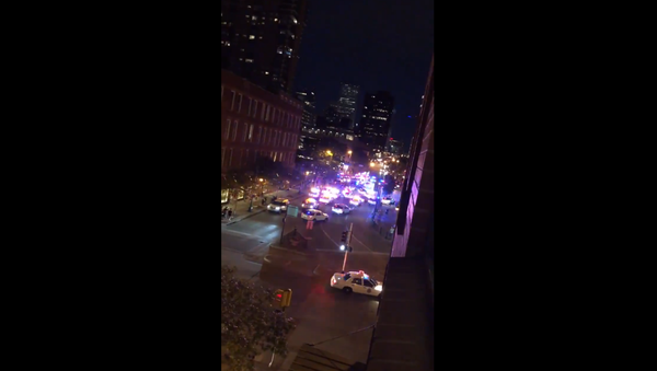 Officers from Denver Police Department chase after stolen tractor - Sputnik International