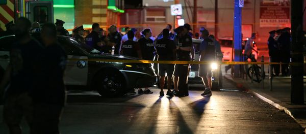 Police are seen near the scene of a mass shooting in Toronto, Canada, July 22, 2018 Police are seen near the scene of a mass shooting in Toronto, Canada, July 22, 2018 - Sputnik International