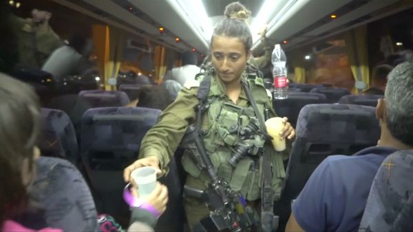 An Israeli solider hands out water on a bus, during the Syria Civil Defence, also known as the White Helmets, extraction from the Golan Heights, Israel in this still image taken from video, provided by the Israeli Army July 22, 2018 An Israeli solider hands out water on a bus, during the Syria Civil Defence, also known as the White Helmets, extraction from the Golan Heights, Israel in this still image taken from video, provided by the Israeli Army July 22, 2018 - Sputnik International