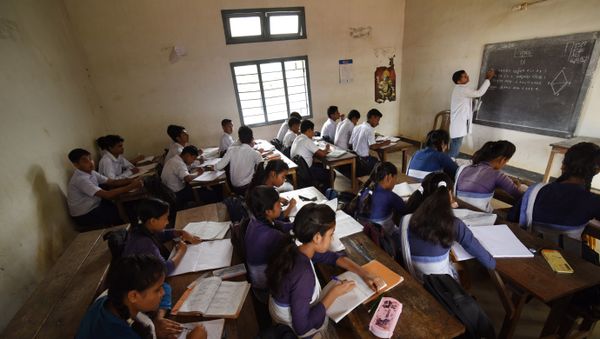 In this photograph taken on June 1, 2016, Indian schoolchildren and teachers take part in lessons in classrooms at Rashtriya Swayamsevak Sangh(RSS)run Sankardev Sishu Nikatan School in the Betkuchi area of Guwahati - Sputnik International