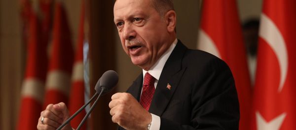 Turkish President Tayyip Erdogan delivers a speech during a ceremony marking the second anniversary of the attempted coup at the Presidential Palace in Ankara, Turkey, on July 15, 2018 Turkish President Tayyip Erdogan delivers a speech during a ceremony marking the second anniversary of the attempted coup at the Presidential Palace in Ankara, Turkey, on July 15, 2018 - Sputnik International