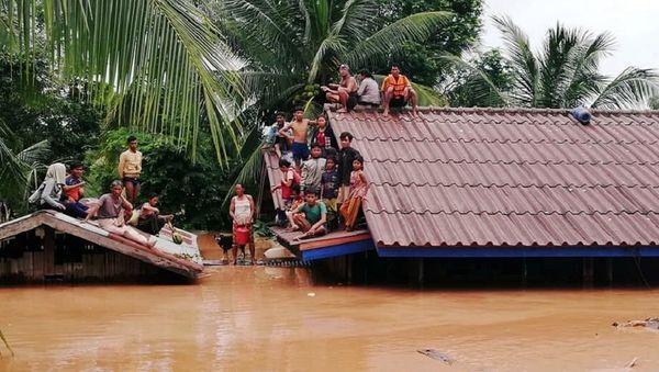 Villagers evacuate after the Xepian-Xe Nam Noy hydropower dam collapsed in Attapeu province, Laos July 24, 2018 Villagers evacuate after the Xepian-Xe Nam Noy hydropower dam collapsed in Attapeu province, Laos July 24, 2018 - Sputnik International
