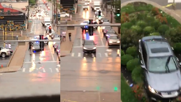 Sleeping US Motorist Startled by Police, Blows Through Traffic Light - Sputnik International