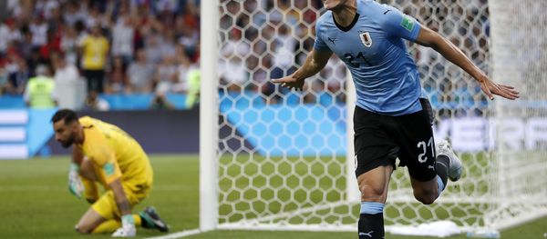 Uruguay's Edinson Cavani celebrates after he scored the opening goal during the round of 16 match between Uruguay and Portugal at the 2018 soccer World Cup at the Fisht Stadium in Sochi, Russia, Saturday, June 30, 2018 Uruguay's Edinson Cavani celebrates after he scored the opening goal during the round of 16 match between Uruguay and Portugal at the 2018 soccer World Cup at the Fisht Stadium in Sochi, Russia, Saturday, June 30, 2018 - Sputnik International