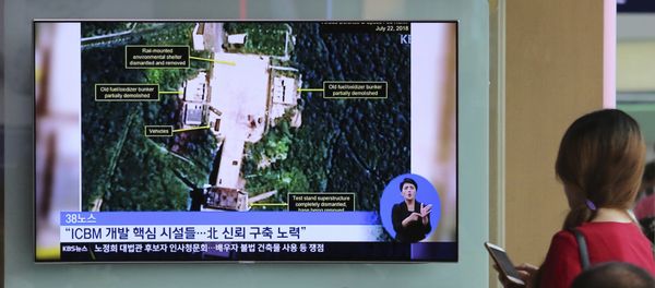 A TV screen shows a satellite image of North Korea's Sohae launch site, during a news program at the Seoul Railway Station in Seoul, South Korea, Tuesday, July 24, 2018. A TV screen shows a satellite image of North Korea's Sohae launch site, during a news program at the Seoul Railway Station in Seoul, South Korea, Tuesday, July 24, 2018. - Sputnik International