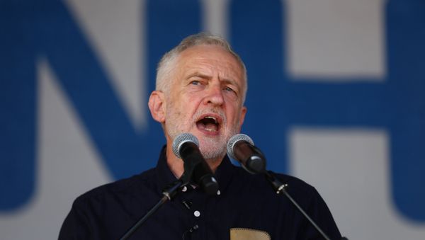 Britain's opposition Labour Party leader, Jeremy Corbyn, addresses demonstrators following a march in support of the National Health Service, in central London, Britain, June 30, 2018 - Sputnik International
