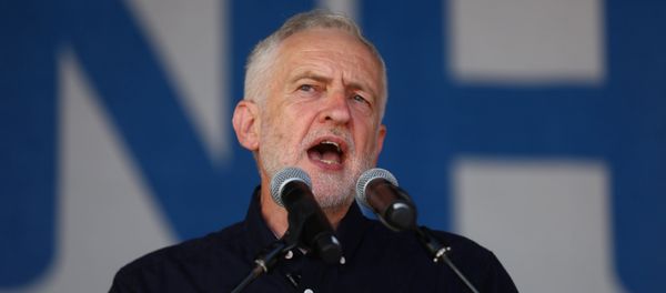 Britain's opposition Labour Party leader, Jeremy Corbyn, addresses demonstrators following a march in support of the National Health Service, in central London, Britain, June 30, 2018 Britain's opposition Labour Party leader, Jeremy Corbyn, addresses demonstrators following a march in support of the National Health Service, in central London, Britain, June 30, 2018 - Sputnik International