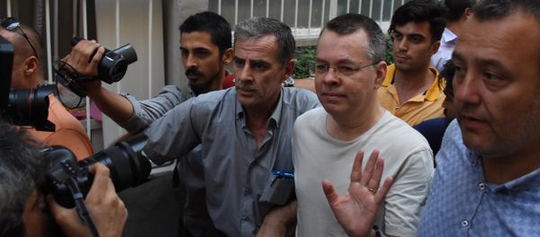 U.S. pastor Andrew Brunson reacts as he arrives at his home after being released from the prison in Izmir, Turkey July 25, 2018 - Sputnik International