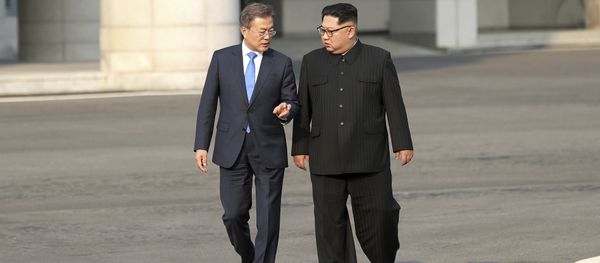 North Korean leader Kim Jong Un, right, talks with South Korean President Moon Jae-in at the border village of Panmunjom in the Demilitarized Zone, South Korea, Friday, April 27, 2018 North Korean leader Kim Jong Un, right, talks with South Korean President Moon Jae-in at the border village of Panmunjom in the Demilitarized Zone, South Korea, Friday, April 27, 2018 - Sputnik International