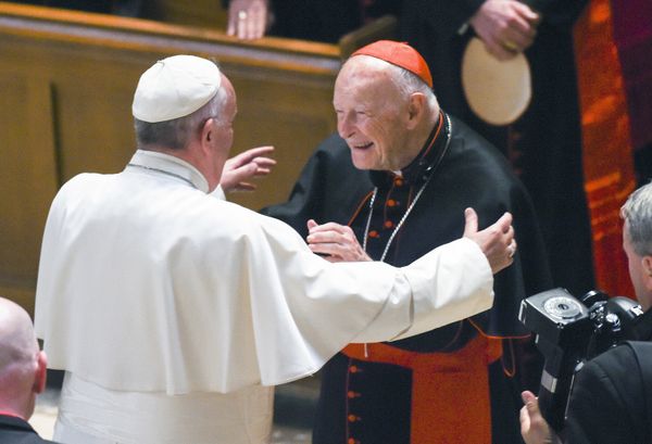 In this Sept. 23, 2015 file photo, Pope Francis reaches out to hug Cardinal Archbishop emeritus Theodore McCarrick after the Midday Prayer of the Divine with more than 300 U.S. Bishops at the Cathedral of St. Matthew the Apostle in Washington. Pope Francis has accepted U.S. prelate Theodore McCarrick's offer to resign from the College of Cardinals following allegations of sexual abuse, including one involving an 11-year-old boy, and ordered him to conduct a life of prayer and penance in a home to be designated by the pontiff until a church trial is held, the Vatican said Saturday In this Sept. 23, 2015 file photo, Pope Francis reaches out to hug Cardinal Archbishop emeritus Theodore McCarrick after the Midday Prayer of the Divine with more than 300 U.S. Bishops at the Cathedral of St. Matthew the Apostle in Washington. Pope Francis has accepted U.S. prelate Theodore McCarrick's offer to resign from the College of Cardinals following allegations of sexual abuse, including one involving an 11-year-old boy, and ordered him to conduct a life of prayer and penance in a home to be designated by the pontiff until a church trial is held, the Vatican said Saturday - Sputnik International