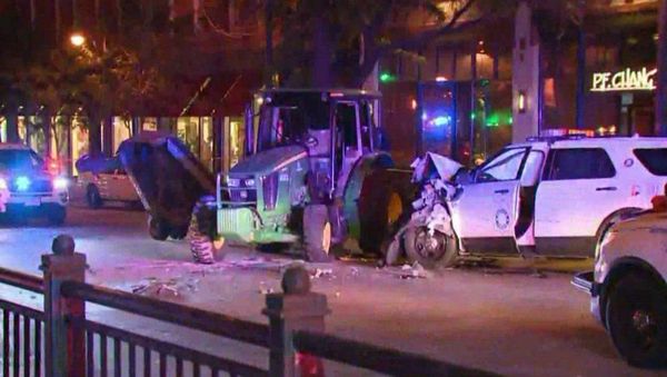 A man accused of stealing a tractor before leading Denver police on a slow-speed chase through the city also is charged with biting and choking a police dog and stealing two other cars A man accused of stealing a tractor before leading Denver police on a slow-speed chase through the city also is charged with biting and choking a police dog and stealing two other cars - Sputnik International