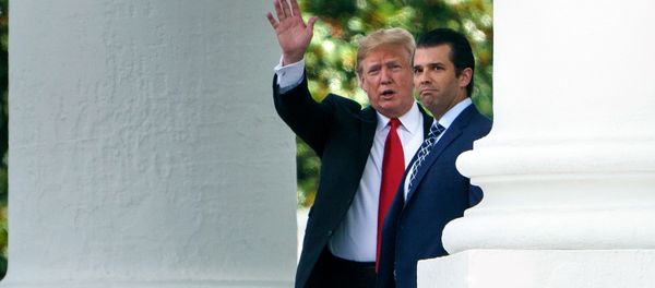 US President Donald Trump (L) and his son Donald Trump, Jr., walk to a motorcade from the North Portico of the White House July 5, 2018 in Washington, DC. US President Donald Trump (L) and his son Donald Trump, Jr., walk to a motorcade from the North Portico of the White House July 5, 2018 in Washington, DC. - Sputnik International