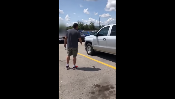 Ontario man arrested and charged after threatening a couple outside of a Walmart - Sputnik International