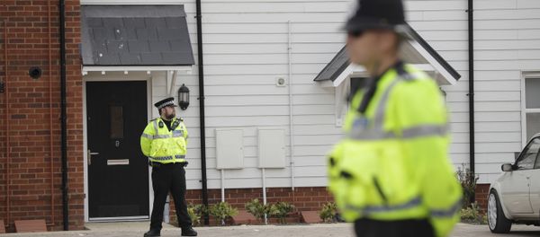 British police officers stand outside the front door of a residential property in Amesbury, England, Wednesday, July 4, 2018. British police have declared a major incident after two people were exposed to an unknown substance in the town, and are cordoning off places the people are known to have visited before falling ill British police officers stand outside the front door of a residential property in Amesbury, England, Wednesday, July 4, 2018. British police have declared a major incident after two people were exposed to an unknown substance in the town, and are cordoning off places the people are known to have visited before falling ill - Sputnik International