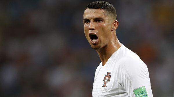 Soccer Football - World Cup - Group B - Portugal vs Spain - Fisht Stadium, Sochi, Russia - June 15, 2018 Portugal's Cristiano Ronaldo lines up before scoring their third goal from a free kick - Sputnik International