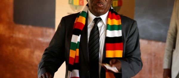 Zimbabwe's President Emmerson Mnangagwa votes in the general election at Sherwood Park Primary School in Kwekwe, Zimbabwe - Sputnik International