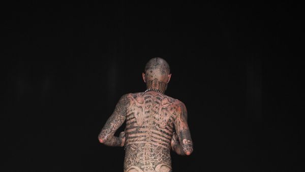 Canadian model Rick Genest, aka Zombie Boy, wears a creation by Auslander during the Fashion Rio Summer 2012 collection in Rio de Janeiro, Brazil, Saturday, June 4, 2011 - Sputnik International