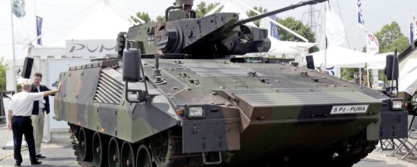 A German S Pz Puma equipped with an effective vision concept and a 30mm Mauser canon is on display at the Eurosatory arms show, in Villepinte, outside Paris, Wednesday, June 14, 2006. Several tank makers said the Iraq war has provided a welcome injection of ideas and cash for research into future tanks. - Sputnik International
