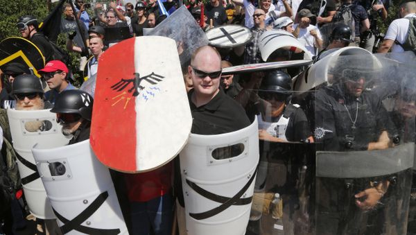 White nationalist demonstrators use shields in Charlottesville, VA, Aug. 12, 2017 White nationalist demonstrators use shields in Charlottesville, VA, Aug. 12, 2017 - Sputnik International