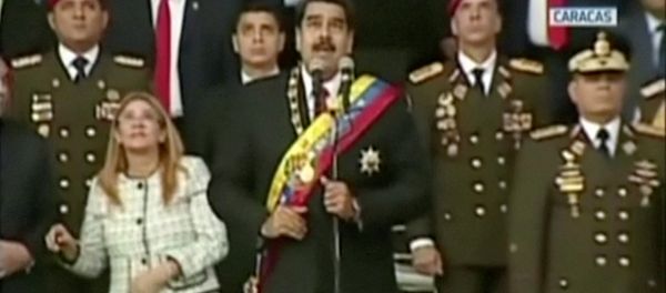 Venezuelan President Nicolas Maduro reacts during an event which was interrupted, in this still frame taken from video August 4, 2018, Caracas, Venezuela. Venezuelan President Nicolas Maduro reacts during an event which was interrupted, in this still frame taken from video August 4, 2018, Caracas, Venezuela. - Sputnik International