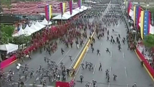 Venezuelan National Guard soldiers run during an event which was interrupted, in this still frame taken from video August 4, 2018, Caracas, Venezuela. Venezuelan National Guard soldiers run during an event which was interrupted, in this still frame taken from video August 4, 2018, Caracas, Venezuela. - Sputnik International