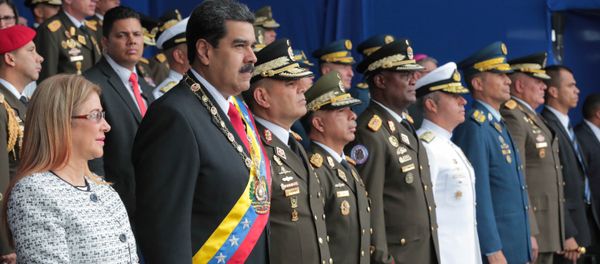 El presidente de Venezuela, Nicolás Maduro, y su esposa, Cilia Flores, asisten a un evento militar en Caracas, Venezuela, el 4 de agosto de 2018. El presidente de Venezuela, Nicolás Maduro, y su esposa, Cilia Flores, asisten a un evento militar en Caracas, Venezuela, el 4 de agosto de 2018. - Sputnik International