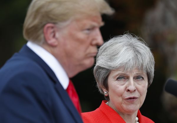 British Prime Minister Theresa May, right, looks over to President Donald Trump, left, during their joint news conference at Chequers, in Buckinghamshire, England, Friday, July 13, 2018 British Prime Minister Theresa May, right, looks over to President Donald Trump, left, during their joint news conference at Chequers, in Buckinghamshire, England, Friday, July 13, 2018 - Sputnik International