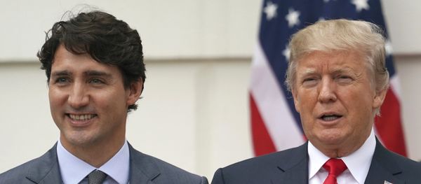 President Donald Trump and Canadian Prime Minister Justin Trudeau pose for a photo as Trudeau arrives at the White House in Washington, Wednesday, Oct. 11, 2017 - Sputnik International