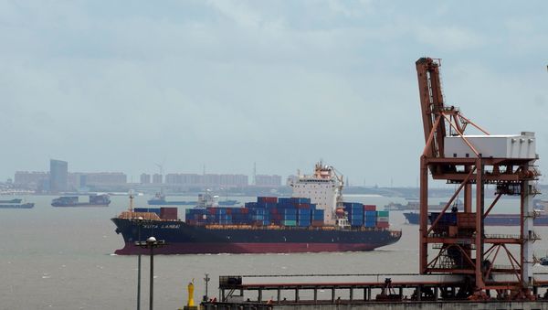 Shipping containers are seen at a port in Shanghai, China July 10, 2018 Shipping containers are seen at a port in Shanghai, China July 10, 2018 - Sputnik International