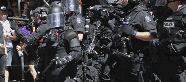 Police deploy flash bang grenades during a rally in Portland, Ore., Saturday, Aug. 4, 2018. Police deploy flash bang grenades during a rally in Portland, Ore., Saturday, Aug. 4, 2018. - Sputnik International