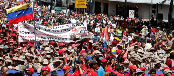 Militia members and supporters of Venezuela's President Nicolas Maduro attend a rally in support of him in Caracas, Venezuela August 6, 2018. Militia members and supporters of Venezuela's President Nicolas Maduro attend a rally in support of him in Caracas, Venezuela August 6, 2018. - Sputnik International