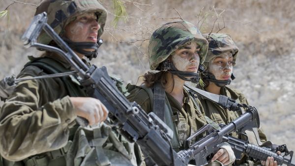 Israeli soldiers from the mixed-gender Bardalas battalion take part in a training at a military camp near the northern Israeli city of Yoqne'am Illit on September 13, 2016 Israeli soldiers from the mixed-gender Bardalas battalion take part in a training at a military camp near the northern Israeli city of Yoqne'am Illit on September 13, 2016 - Sputnik International