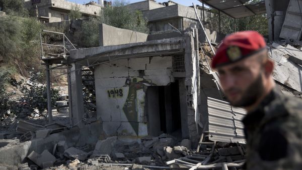 A Palestinian Hamas military policeman inspects the damage caused by Israeli airstrikes in Gaza City, Thursday, Aug. 9, 2018. Israel struck targets in the Gaza Strip after dozens of rockets were launched Wednesday from the coastal territory ruled by the Islamic militant Hamas group, the Israeli military said - Sputnik International