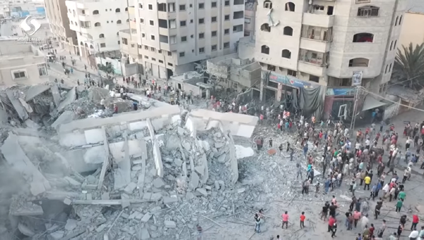 Israel bombed the Said al-Mishal Cultural Center on Thursday in what the country said was retaliation over rocket fire from Gaza before before reaching a ceasefire with Hamas later that night. - Sputnik International
