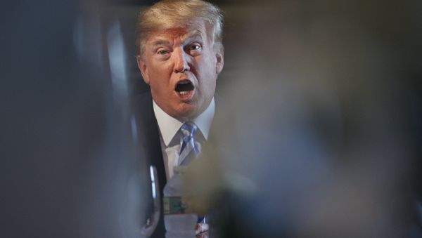 President Donald Trump speaks as he meets with state leaders about prison reform, Thursday, Aug. 9, 2018, at Trump National Golf Club in Bedminster, N.J. President Donald Trump speaks as he meets with state leaders about prison reform, Thursday, Aug. 9, 2018, at Trump National Golf Club in Bedminster, N.J. - Sputnik International