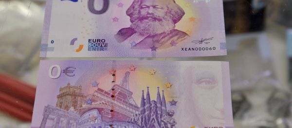 This picture taken on April, 10, 2018 in Trier, southwestern Germany, shows the front and the back side of a Zero-Euro-bank note realeased on the occasion of German philosopher Karl Marx's bicentenary This picture taken on April, 10, 2018 in Trier, southwestern Germany, shows the front and the back side of a Zero-Euro-bank note realeased on the occasion of German philosopher Karl Marx's bicentenary - Sputnik International