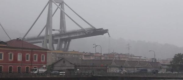 A motorway bridge which collapsed on Tuesday near the northern Italian port city of Genoa A motorway bridge which collapsed on Tuesday near the northern Italian port city of Genoa - Sputnik International