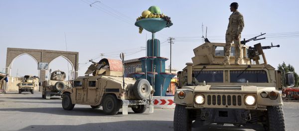 In this Sunday, Aug. 12, 2018, photo, Afghan security personnel patrol in the city of Ghazni province west of Kabul, Afghanistan. - Sputnik International