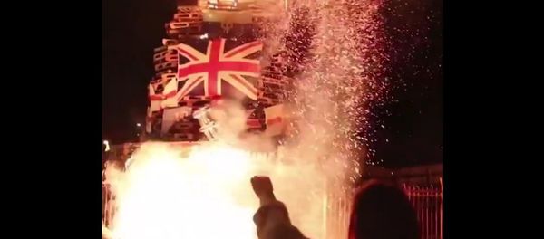 Union Jacks and Ulster Banners burn in Bogside bonfire Union Jacks and Ulster Banners burn in Bogside bonfire - Sputnik International