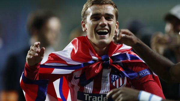 Atletico's Antoine Griezmann celebrates after winning the UEFA Super Cup final soccer match between Real Madrid and Atletico Madrid at the Lillekula Stadium in Tallinn, Estonia, Wednesday, Aug. 15, 2018 Atletico's Antoine Griezmann celebrates after winning the UEFA Super Cup final soccer match between Real Madrid and Atletico Madrid at the Lillekula Stadium in Tallinn, Estonia, Wednesday, Aug. 15, 2018 - Sputnik International
