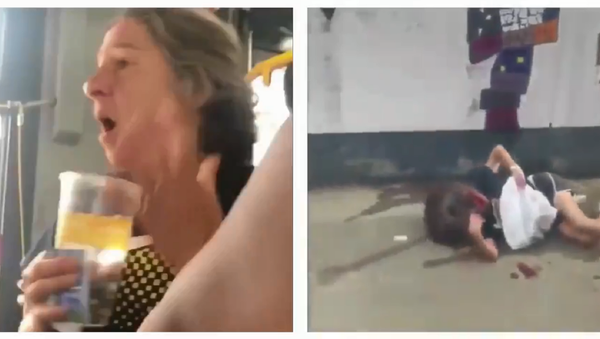 A woman who used the n-word on a crowded Washington, DC, bus during the evening rush hour was left bloodied on the sidewalk afterwards and taken to the hospital with lacerations on her face and head. - Sputnik International