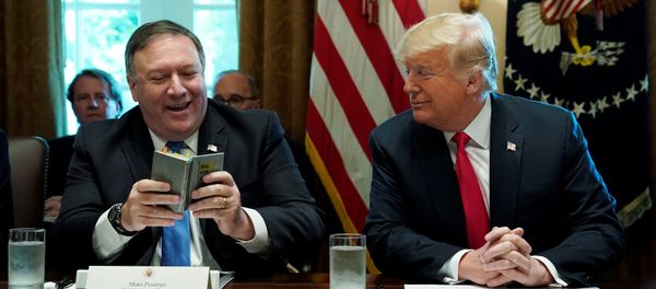U.S. Secretary of State Mike Pompeo and U.S. President Donald Trump look at Pompeo's West Point cadet handbook from his time at the U.S. Military Academy in the 1980s after Pompeo read a prayer from the book at the start of a cabinet meeting at the White House in Washington, U.S., August 16, 2018. U.S. Secretary of State Mike Pompeo and U.S. President Donald Trump look at Pompeo's West Point cadet handbook from his time at the U.S. Military Academy in the 1980s after Pompeo read a prayer from the book at the start of a cabinet meeting at the White House in Washington, U.S., August 16, 2018. - Sputnik International