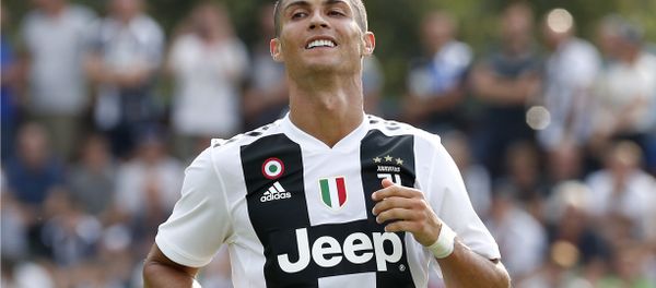 Juventus' Cristiano Ronaldo smiles during a friendly soccer match between the Juventus A and B teams, in Villar Perosa, near Turin, Italy, Sunday, Aug.12, 2018 Juventus' Cristiano Ronaldo smiles during a friendly soccer match between the Juventus A and B teams, in Villar Perosa, near Turin, Italy, Sunday, Aug.12, 2018 - Sputnik International